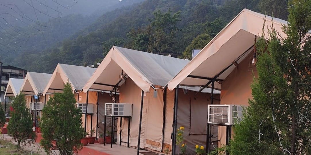 Luxury Swiss air-conditioned tent exterior surrounded by nature at The Jungle Mist Resort