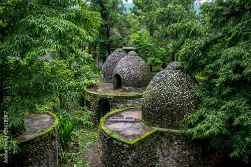 Historic Beatles Ashram ruins with spiritual artwork in Rishikesh, world-famous meditation retreat